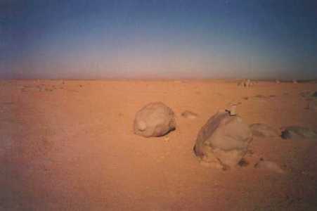 Strange stones in a very flat spaces in the Namib desert.
