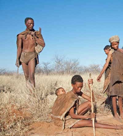 San / Bushmen people of Namibia wearing garments made from animal skins 